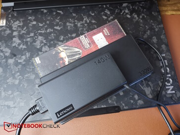 The smaller 140-watt USB-C power supply