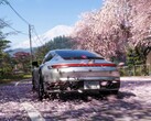 A Porsche car driving through Japan. 