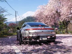 A Porsche car driving through Japan.