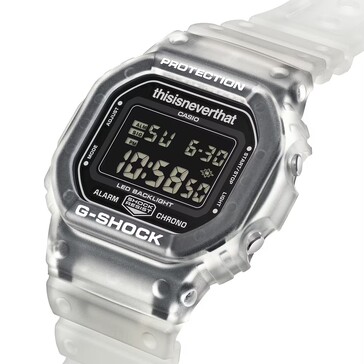 Angled close-up of the Casio G-Shock DW-5600TNT-7 with translucent case and inverted digital screen.