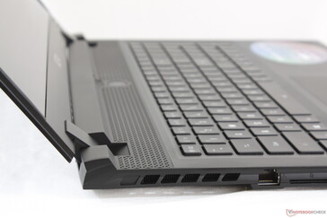 Outer lid opened to maximum angle (~140 degrees). Hinges are firm no matter the angle with no teetering when typing