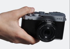 Fujifilm X-E4 compact interchangeable lens camera in hand