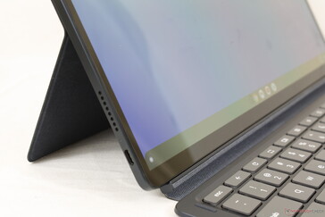 Kickstand is firm and works well at most angles. However, the tablet tends to tip over if the angle is too small