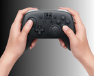 Nintendo Switch 2 Pro Controller subjected to teardown shown in hands (Image source: Nintendo of America with edits)
