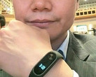 Xiaomi CEO Lei Jun posing with Mi Band 2