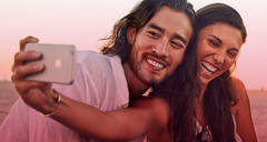 Wouldn&#039;t you be all smiles too if you only had to pay $1 for monthly mobile service? (Source: Virgin Mobile)