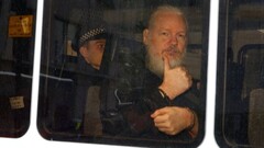 Julian Assange after being arrested by the London Metropolitan Police (Image source: Reuters)