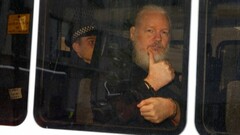 Julian Assange after being arrested by the London Metropolitan Police (Image source: Reuters)