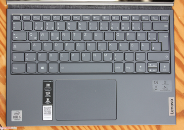Type cover with Bluetooth connection. A battery is included so you can use the keyboard without docking it onto the tablet