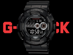 Pictured, a close up of the Casio G-Shock GD100-1B dial, with the text &quot;G-Shock&quot; in red in the background. (Image source: Casio - Edited)