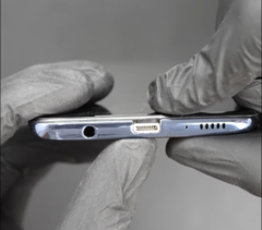 The Samsung Galaxy A51 has been modified with a lightning port (image via Ken Pi on YouTube)