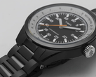 The Huckberry x Timex 1979 Black Max, pictured with a black stainless-steel strap against a white background. (Image source: Timex)
