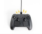 Artistic render of Steam Controller charging with the magnetic puck.