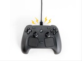 Artistic render of Steam Controller charging with the magnetic puck.