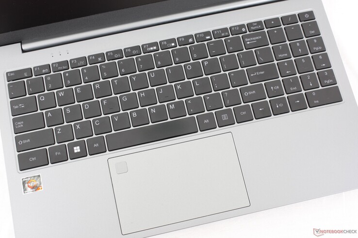Full-size numpad and arrow keys. Clickpad is 12.5 x 7.5 cm with a sharp and very loud click when pressed