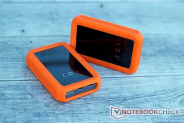 The orange silicone bumpers add some thickness but offer better shock protection.