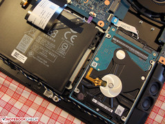 Hard drive and battery (screw-fastened)