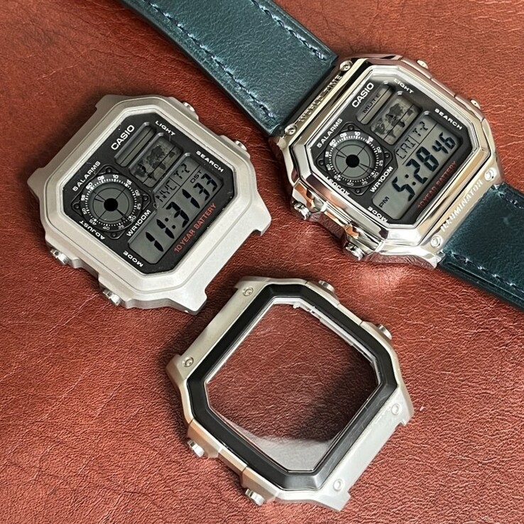 The stainless-steel case adds even more durability than the resin case of the standard Casio AE-1200. (Image source: SKXMOD)