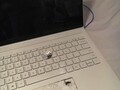 Twitter user Aaron's Surface Book after taking a bullet (Image source: @itsExtreme_)