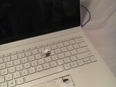 Twitter user Aaron's Surface Book after taking a bullet (Image source: @itsExtreme_)