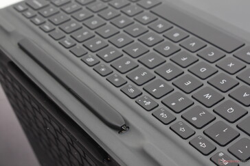 Active pen "garage" sits on the keyboard base for charging and carrying