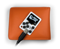 The Arduboy Mini will fit comfortably inside a wallet. (Image source: Kevin Bates)