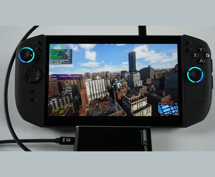 Lenovo Legion Go 2 handheld gaming PC running Spider-Man 2, connected via USB4 to an Adlink Pocket AI external GPU for battery-powered dual-GPU testing. (Image source: ETA PRIME via YouTube)