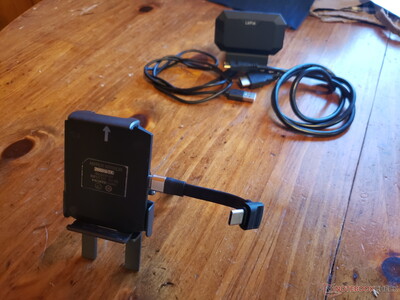 The metal stand attached to the mobile phone mount is shown here. This stand keeps the transmitter aimed in the air, helping signal quality.