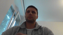 The incorrectly placed webcam results in awkward angles while video conferencing.