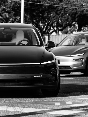 The Tesla Robotaxi platform logo at the front bumper.