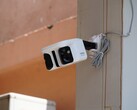 Baseus X1 Pro security camera mounted on a wall.