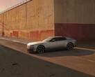 Jaguar Type 01 EV in the evening sun in front of a high wall
