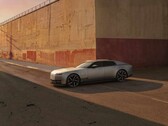 Jaguar Type 01 EV in the evening sun in front of a high wall