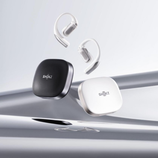 The Shokz OpenFit Pro (with case), pictured against a stylized silver background. (Image source: Shokz)