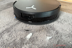 When vacuuming a carpet with different test dirt...