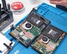 Teardown view of the Nintendo Switch 2 showing internal components including battery, fan, and mainboard (Image source: Phone Repair Guru on YouTube)