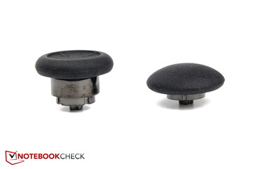 Two replacement stick caps with different heights and curvatures
