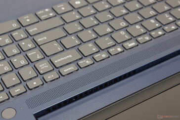 New speaker grilles above the first row of keyboard keys