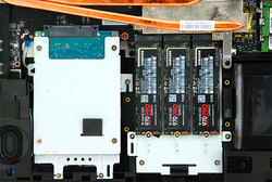 All four bays side by side. Not shown: a metal plate cover for the three M.2 drives