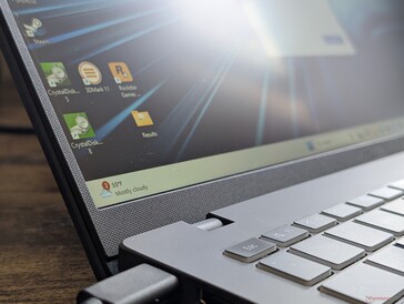 No edge-to-edge glass, touchscreen, or G-Sync support for the main display