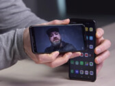 Hilsenteger with his S10+, a Pixel 3 and the video that apparently hacked Face Unlock. (Source: YouTube)