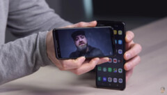 Hilsenteger with his S10+, a Pixel 3 and the video that apparently hacked Face Unlock. (Source: YouTube)
