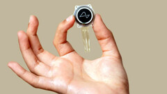 The brain implant's 1024 electrodes are attached by a robot (image: Neuralink)