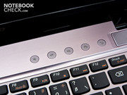The capacitive control buttons are above the keyboard's right.