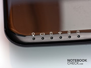Status LEDs on the edge of the high-gloss palm rest.