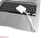 A DisplayPort adapter is not included in delivery. Accessories from third-party manufacturers are often cheaper than the ones offered by Apple.
