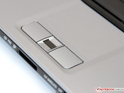 The fingerprint reader is located between both mouse keys.
