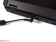 The power jack is on the back; the power plug is angled.