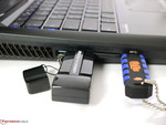 Large USB devices block the neighboring ports.