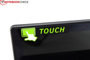A sticker advertises the touchscreen.